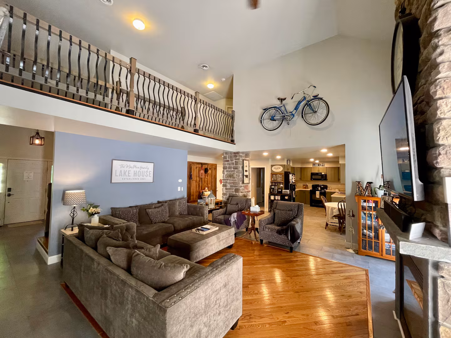 Open concept living room with catwalk